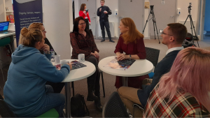 Shirley-Ann Sommerville, Cabinet Secretary for Social Justice and Neil Campbell, CEO for Dundee Carers Centre sits with carers for a chat at a Dundee Carers Centre event to mark the launch of the Carers Support Payment. 