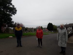 Neil Dalgliesh - Volunteer Walk leader stands with 2 other participants during a walking group