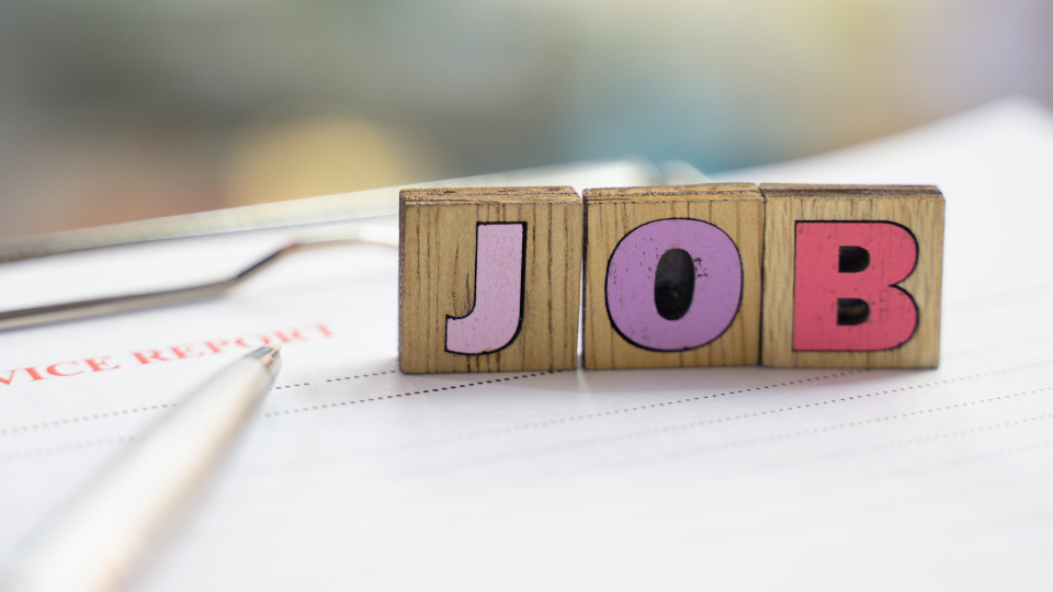 Image of three wooden letter blocks that spell out the word 