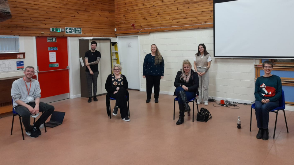 Image of 6 members of staff that are support learning for Adult carers in the East end